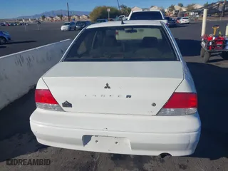 2003 Mitsubishi Lancer ES with VIN JA3AJ26E43U098235, listed as a IAAI auction lot 41646788 with 133,305 mi miles. Bid and sale history available at carsss.com. Image 13.