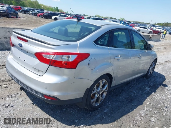 2014 Ford Focus Titanium with VIN 1FADP3J27EL227261, listed as a IAAI auction lot 41972536 with 172,470 mi miles. Bid and sale history available at carsss.com. Image 4.
