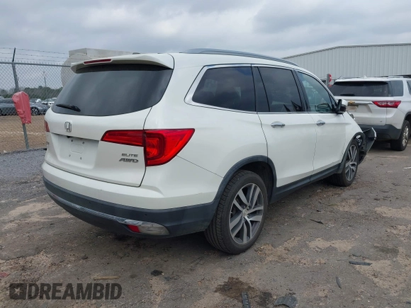 2017 Honda Pilot Elite with VIN 5FNYF6H04HB042192, listed as a IAAI auction lot 41780875 with 158,491 mi miles and . Bid and sale history available at DreamBid. Image 4.