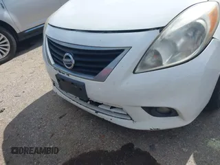 2012 Nissan Versa SV with VIN 3N1CN7AP6CL915352, listed as a IAAI auction lot 42720220 with 187,005 mi miles and . Bid and sale history available at DreamBid. Image 12.