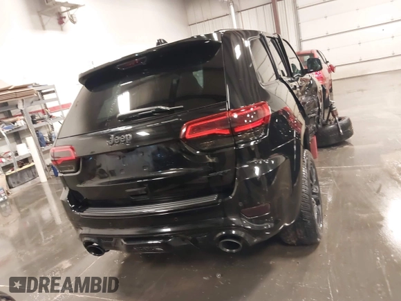 2017 Jeep Grand Cherokee SRT with VIN 1C4RJFDJ9HC739324, listed as a IAAI auction lot 40898998 with 92,547 mi miles. Bid and sale history available at carsss.com. Image 16.