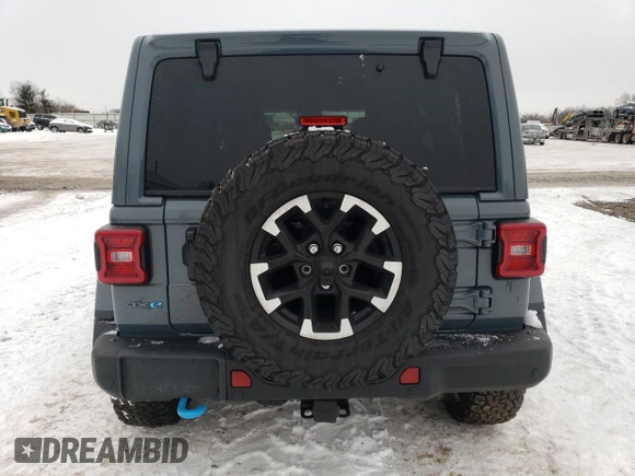 2024 Jeep Wrangler Rubicon with VIN 1C4RJXR66RW237347, listed as a Copart auction lot 88774995 with 18,018 mi miles and Salvage Title. Bid and sale history available at DreamBid. Image 6.