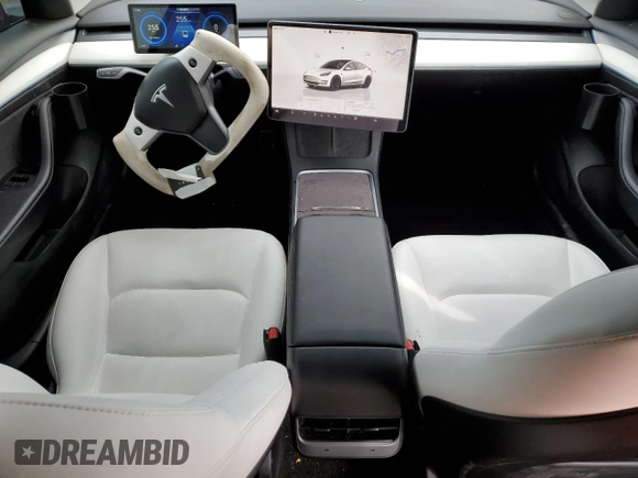 2022 Tesla Model 3 Long Range with VIN 5YJ3E1EB4NF164276, listed as a Copart auction lot 45802865 with 56,836 mi miles and Salvage Title. Bid and sale history available at DreamBid. Image 8.