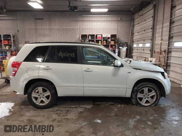 2006 Suzuki Grand Vitara Luxury with VIN JS3TD947764101438, listed as a IAAI auction lot 41610148 with 172,483 mi miles and . Bid and sale history available at DreamBid. Image 14.