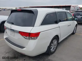 2016 Honda Odyssey EX-L with VIN 5FNRL5H68GB112223, listed as a IAAI auction lot 42056616 with 126,285 mi miles. Bid and sale history available at carsss.com. Image 4.