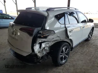 2018 Toyota RAV4 XLE with VIN JTMWFREV2JJ740145, listed as a Copart auction lot 52214075 with 129,940 mi miles and Salvage title. Bid and sale history available at DreamBid. Image 3.