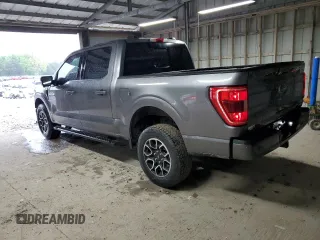 2021 Ford F-150 XL with VIN 1FTFW1E82MFA21318, listed as a Copart auction lot 54409795 with 74,977 mi miles and Salvage Title. Bid and sale history available at carsss.com. Image 2.