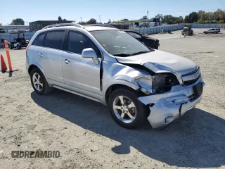 2012 Chevrolet Captiva Sport LTZ with VIN 3GNFL4E54CS642304, listed as a Copart auction lot 72623484 with 114,554 mi miles and Salvage Title. Bid and sale history available at DreamBid. Image 4.