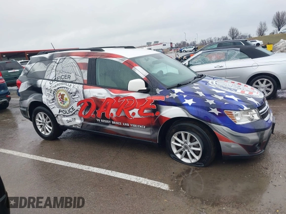 2018 Dodge Journey SXT z VIN 3C4PDCBG2JT186899, wystawiony jako IAAI lot #41465626 z przebiegiem 40 079 mil mil oraz . Historia ofert i sprzedaży dostępna na DreamBid. Obrazek 13.