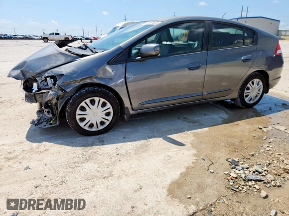 2010 Honda Insight LX with VIN JHMZE2H52AS043392, listed as a Copart auction lot 61347625 with 194,248 mi miles and Salvage title. Bid and sale history available at DreamBid. Image 1.
