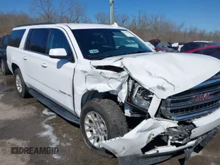 2019 GMC Yukon XL SLT with VIN 1GKS1GKC0KR330715, listed as a IAAI auction lot 41758626 with 134,641 mi miles. Bid and sale history available at carsss.com. Image 1.
