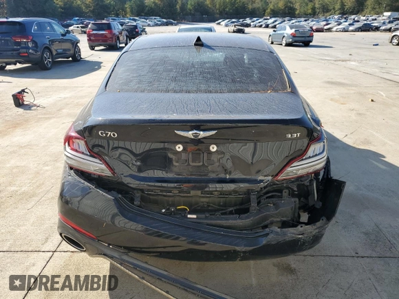 2021 Genesis G70 3.3T with VIN KMTG34LE7MU066534, listed as a Copart auction lot 77532704 with 58,951 mi miles and Salvage Title. Bid and sale history available at carsss.com. Image 6.