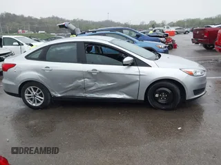 2017 Ford Focus SE with VIN 1FADP3F24HL303600, listed as a IAAI auction lot 41948159 with 95,212 mi miles and . Bid and sale history available at DreamBid. Image 14.