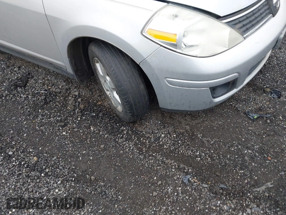 2008 Nissan Versa 1.8 S with VIN 3N1BC13EX8L369608, listed as a IAAI auction lot 42046943 with 133,826 mi miles. Bid and sale history available at carsss.com. Image 13.
