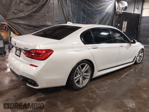 2019 BMW 7 Series 740i xDrive with VIN WBA7E4C59KGV70391, listed as a IAAI auction lot 41531991 with 70,017 mi miles and . Bid and sale history available at carsss.com. Image 4.