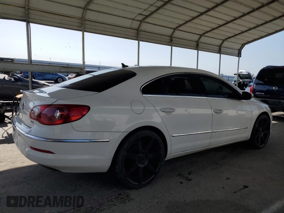 2011 Volkswagen CC Sport z VIN WVWMP7AN8BE721351, wystawiony jako Copart lot #59927035 z przebiegiem 140 724 mil mil oraz Czysty tytuł • Clean title. Historia ofert i sprzedaży dostępna na DreamBid. Obrazek 3.
