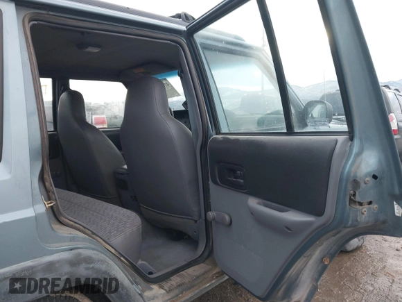 1997 Jeep Cherokee Sport with VIN 1J4FJ68S9VL607515, listed as a IAAI auction lot 41216502 with 238,274 mi miles. Bid and sale history available at carsss.com. Image 8.