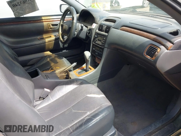 1999 Toyota Solara SE with VIN 2T1CF22PXXC247611, listed as a IAAI auction lot 41863240 with 153,823 mi miles. Bid and sale history available at carsss.com. Image 5.
