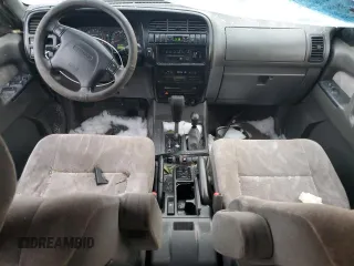 2000 Isuzu Trooper S with VIN JACDJ58X9Y7J18322, listed as a Copart auction lot 42444695 with 149,799 mi miles and Salvage title. Bid and sale history available at DreamBid. Image 8.