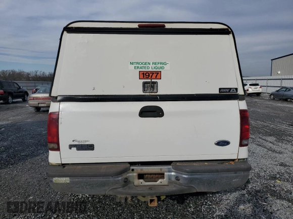 2004 Ford Super Duty F-250 XL with VIN 1FTNX21P04ED89661, listed as a Copart auction lot 45214445 with 314,538 mi miles and Salvage Title. Bid and sale history available at carsss.com. Image 6.