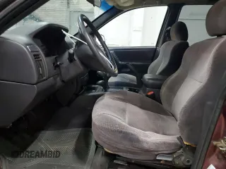 2001 Jeep Grand Cherokee Laredo with VIN 1J4GW48S11C618478, listed as a Copart auction lot 57889965 with Not provided miles and Clean title. Bid and sale history available at DreamBid. Image 7.