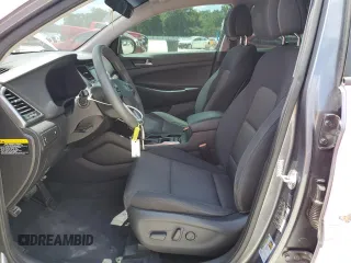 2017 Hyundai Tucson Value with VIN KM8J33A25HU332514, listed as a Copart auction lot 56958845 with 99,818 mi miles and Salvage title. Bid and sale history available at DreamBid. Image 7.