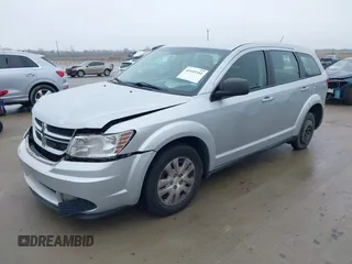 2014 Dodge Journey SE Plus with VIN 3C4PDCAB1ET181480, listed as a IAAI auction lot 41441341 with 189,641 mi miles and . Bid and sale history available at DreamBid. Image 2.