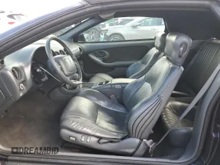 1999 Pontiac Firebird Trans Am with VIN 2G2FV32GXX2229175, listed as a Copart auction lot 65678225 with 180,298 mi miles and Salvage title. Bid and sale history available at DreamBid. Image 7.