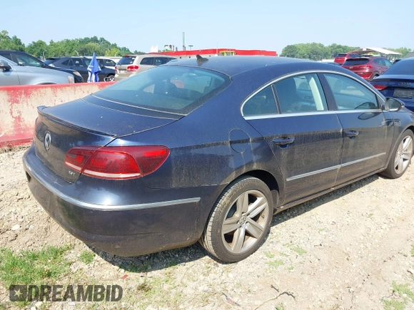 2013 Volkswagen CC Sport Plus z VIN WVWBP7ANXDE553061, wystawiony jako IAAI lot #42468114 z przebiegiem 106 812 mil mil oraz . Historia ofert i sprzedaży dostępna na DreamBid. Obrazek 4.