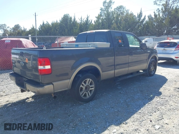 2005 Ford F-150 XLT with VIN 1FTPX12575NA61851, listed as a IAAI auction lot 41713974 with 251,639 mi miles. Bid and sale history available at carsss.com. Image 4.