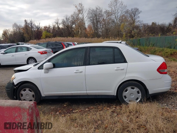 2009 Nissan Versa 1.8 S with VIN 3N1BC11E49L416720, listed as a IAAI auction lot 40960069 with 130,131 mi miles. Bid and sale history available at carsss.com. Image 14.