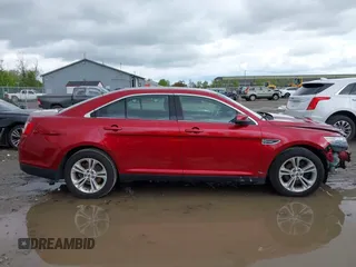2018 Ford Taurus SEL z VIN 1FAHP2E85JG124997, wystawiony jako IAAI lot #42194985 z przebiegiem 86 456 mil mil oraz . Historia ofert i sprzedaży dostępna na DreamBid. Obrazek 14.