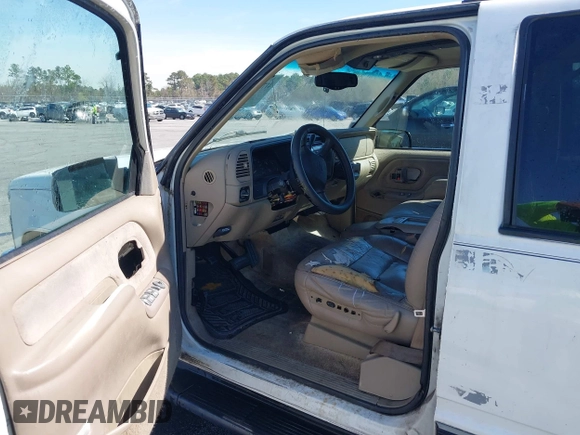 1999 Chevrolet Tahoe Z71 with VIN 1GNEK13R3XJ412067, listed as a IAAI auction lot 41789660 with 196,916 mi miles and . Bid and sale history available at DreamBid. Image 5.