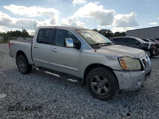2005 Nissan Titan LE with VIN 1N6AA07B85N512010, listed as a Copart auction lot 73065994 with 267,900 mi miles and Salvage Title. Bid and sale history available at carsss.com. Image 4.
