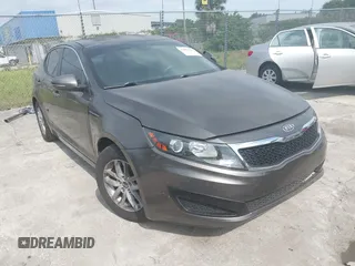 2011 Kia Optima LX with VIN KNAGM4A70B5162915, listed as a IAAI auction lot 42094325 with 156,169 mi miles and . Bid and sale history available at carsss.com. Image 1.