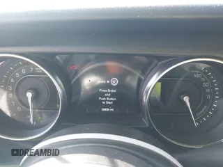 2021 Jeep Wrangler Unlimited Sahara z VIN 1C4JJXP6XMW765398, wystawiony jako IAAI lot #41592185 z przebiegiem 26 834 mil mil oraz . Historia ofert i sprzedaży dostępna na DreamBid. Obrazek 7.
