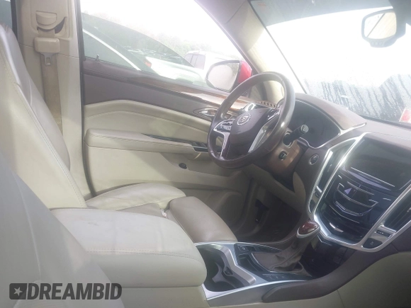 2014 Cadillac SRX Premium Collection with VIN 3GYFNDE36ES564140, listed as a IAAI auction lot 42070008 with 69,768 mi miles and . Bid and sale history available at DreamBid. Image 5.