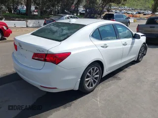 2020 Acura TLX w/Technology Pkg with VIN 19UUB1F56LA008852, listed as a IAAI auction lot 41904628 with 121,478 mi miles. Bid and sale history available at carsss.com. Image 4.