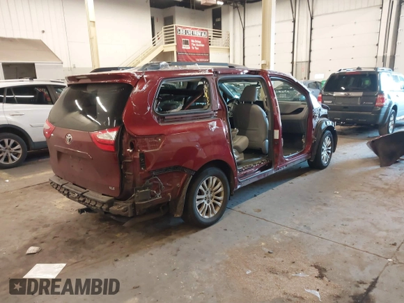 2016 Toyota Sienna XLE with VIN 5TDYK3DCXGS697980, listed as a IAAI auction lot 41500895 with 94,750 mi miles and . Bid and sale history available at DreamBid. Image 4.