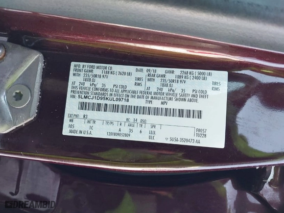 2019 Lincoln MKC Standard with VIN 5LMCJ1D95KUL09718, listed as a IAAI auction lot 41672747 with 73,810 mi miles. Bid and sale history available at carsss.com. Image 9.