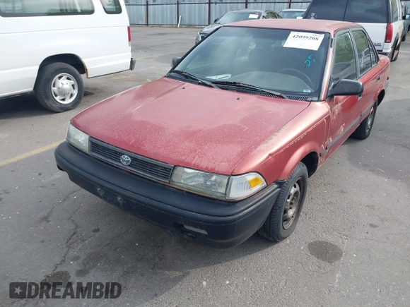1991 Toyota Corolla z VIN 1NXAE94AXMZ209706, wystawiony jako IAAI lot #42099208 z przebiegiem 192 222 mil mil oraz . Historia ofert i sprzedaży dostępna na DreamBid. Obrazek 6.