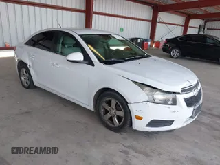 2014 Chevrolet Cruze 1LT with VIN 1G1PC5SB2E7226761, listed as a IAAI auction lot 42029133 with 153,738 mi miles and . Bid and sale history available at DreamBid. Image 1.