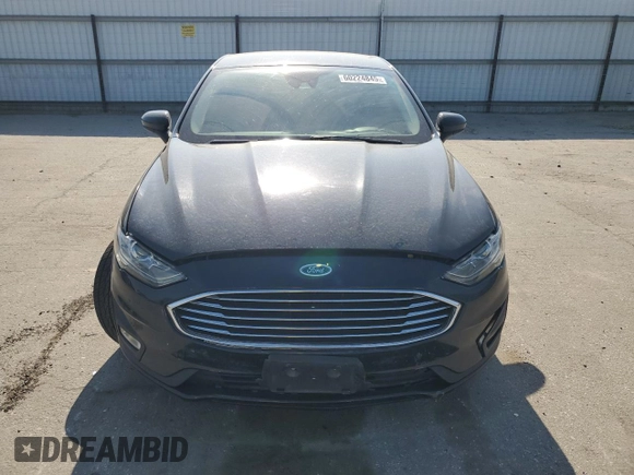 2020 Ford Fusion SE z VIN 3FA6P0HD4LR114834, wystawiony jako Copart lot #60224845 z przebiegiem 84 110 mil mil oraz Szkoda całkowita • Salvage title. Historia ofert i sprzedaży dostępna na DreamBid. Obrazek 5.