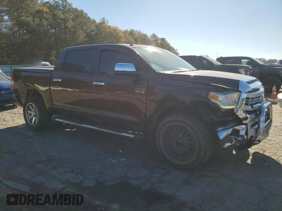 2015 Toyota Tundra 4WD Truck Platinum with VIN 5TFAW5F11FX423931, listed as a Copart auction lot 83350054 with 112,988 mi miles and Salvage Title. Bid and sale history available at carsss.com. Image 4.
