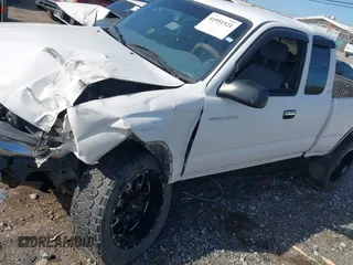 2000 Toyota Tacoma with VIN 5TEWN72N1YZ690947, listed as a IAAI auction lot 41951521 with 207,119 mi miles and . Bid and sale history available at DreamBid. Image 6.