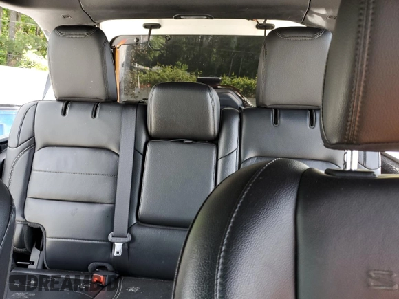 2021 Jeep Wrangler Unlimited Sahara Altitude with VIN 1C4HJXEN3MW691220, listed as a Copart auction lot 56334695 with 46,589 mi miles and Salvage title. Bid and sale history available at DreamBid. Image 10.