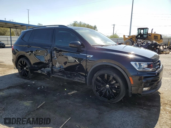 2021 Volkswagen Tiguan SE with VIN 3VV3B7AX6MM152896, listed as a Copart auction lot 58004705 with 62,997 mi miles and Salvage title. Bid and sale history available at DreamBid. Image 4.