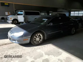 2000 Chrysler LHS z VIN 2C3HC56G4YH359861, wystawiony jako Copart lot #81348894 z przebiegiem 245 047 mil mil oraz Szkody całkowita. Historia ofert i sprzedaży dostępna na DreamBid. Obrazek 1.