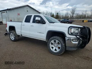 2019 GMC Sierra 1500 SLE z VIN 2GTV2MEC0K1170652, wystawiony jako Copart lot #53474495 z przebiegiem 58 181 mil mil oraz Czysty tytuł • Clean title. Historia ofert i sprzedaży dostępna na DreamBid. Obrazek 4.