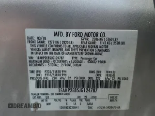2018 Ford Taurus SEL z VIN 1FAHP2E85JG124787, wystawiony jako Copart lot #61688035 z przebiegiem 145 841 mil mil oraz Szkoda całkowita • Salvage title. Historia ofert i sprzedaży dostępna na DreamBid. Obrazek 12.